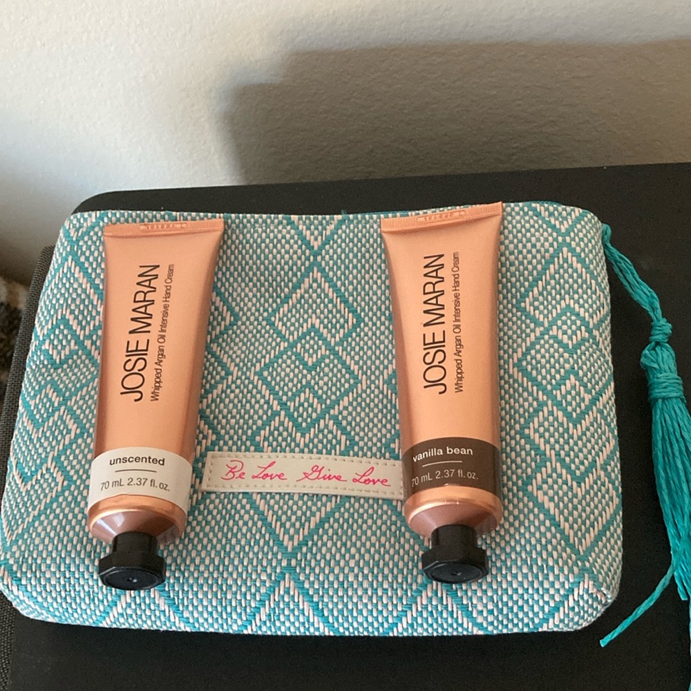 Josie Maran set of 2 hand lotions 2.37 fl. Oz each and pouch